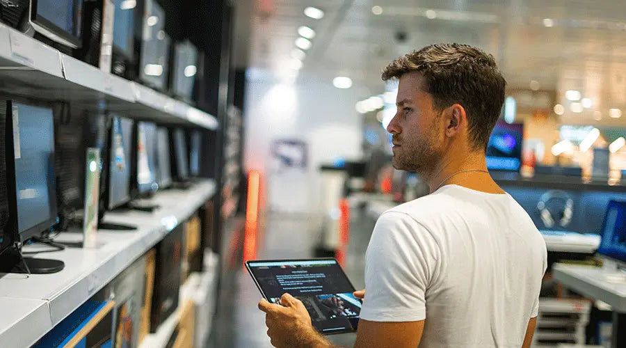 High resale value electronics, including iPhones and MacBooks, at PayMore Milford, MA